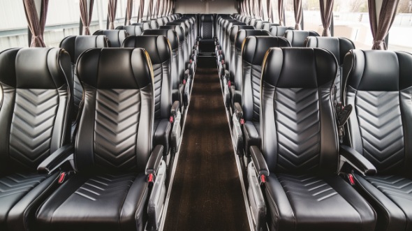 55 passenger charter bus inside old bridge